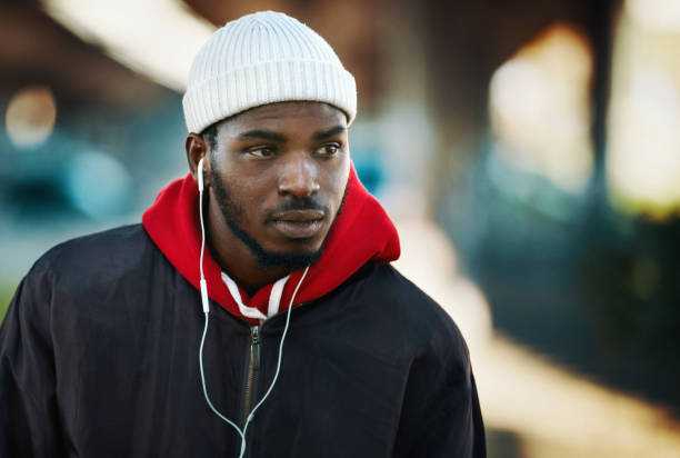 Street portrait of a young African American man.