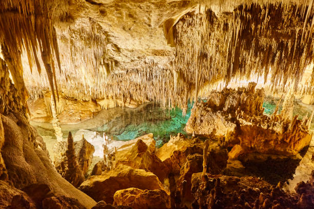 istock Stalactites in a cave. Cuevas del Drach. Mallorca, Spain 1353769328