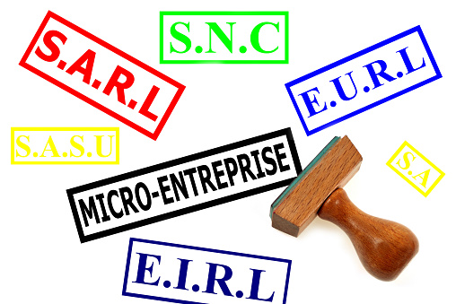 Acronyms of the different statutes of companies in France with an ink stamp