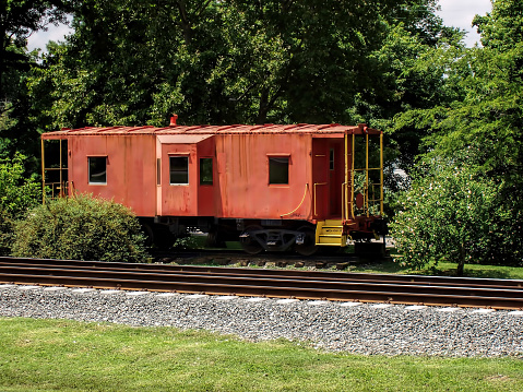 Old red Caboose off of the southern railroad in rural Tennessee.