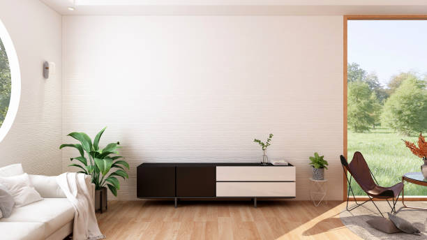 Modern and minimal stylish living room with furniture and blank empty room wall for mock up, 3d rendering stock photo