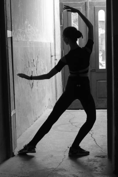 istock woman in ballet pose 1353779503