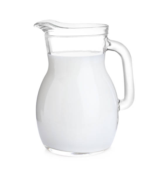 istock Jug of fresh milk isolated on white 1353780453