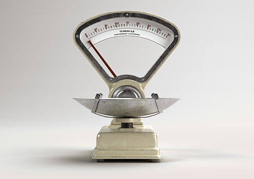 A vintage grocery shop food scale from the 60's on an isolated white studio background - 3D render