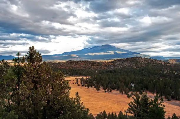 Mount Shasta on a cloudy day in the Fall, California, USA.