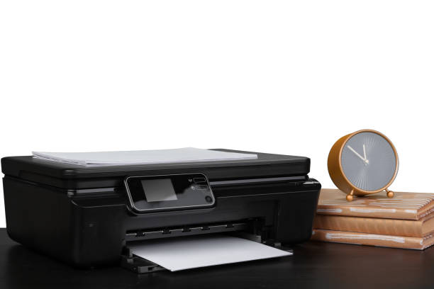istock Office table with laser printer and books against white background 1353785394