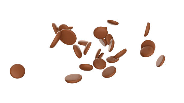 istock Round Chocolate Chips Falling on white isolated floor 3d illustration 1353789703