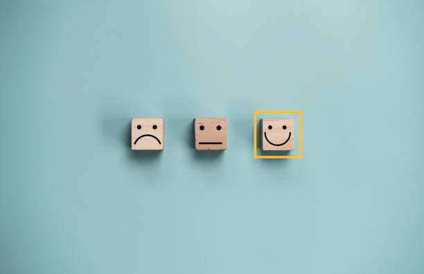 istock Check mark to select smile face with five stars on blue background , Customer evaluation concept. 1353794180