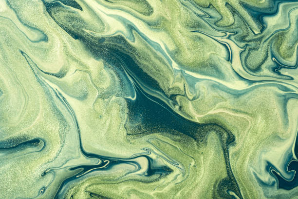 Abstract fluid art background olive and green colors. Liquid marble. Acrylic painting with khaki glitter and gradient. Abstract fluid art background olive and green colors. Liquid marble. Acrylic painting on canvas with khaki glitter and gradient. Alcohol ink backdrop with wavy pattern. khaki green photos stock pictures, royalty-free photos & images