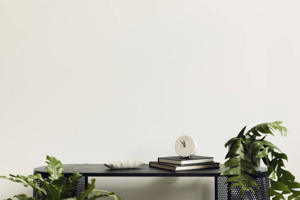 istock Modern scandinavian home interior with design wooden commode, mock up poster map and personal accessories in stylish home decor. Template. 1353810236