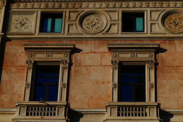 istock Building next to the Duomo, Milan 1353813544