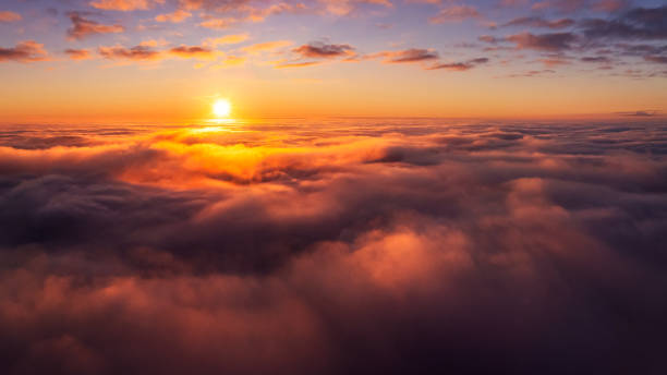 istock Dramatic aerial landscape of setting sun in the sky 1353814203