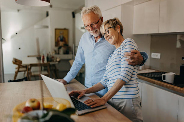 istock Senior couple enjoy together at home 1353816450
