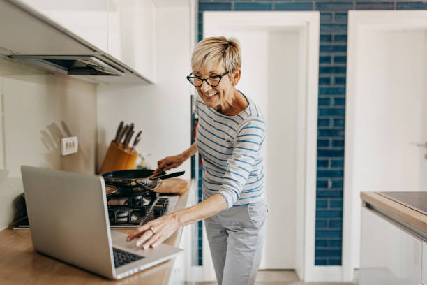 istock Home alone and preparing food 1353816531