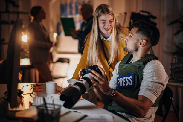 istock Work night in news editorial office 1353817371