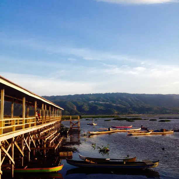 Photo of fishing boats leaning on the pier of Limboto lake in Hutada'a village, Gorontalo