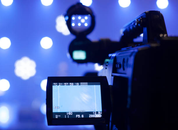 istock television camera. camera in a concert hall 1353821127
