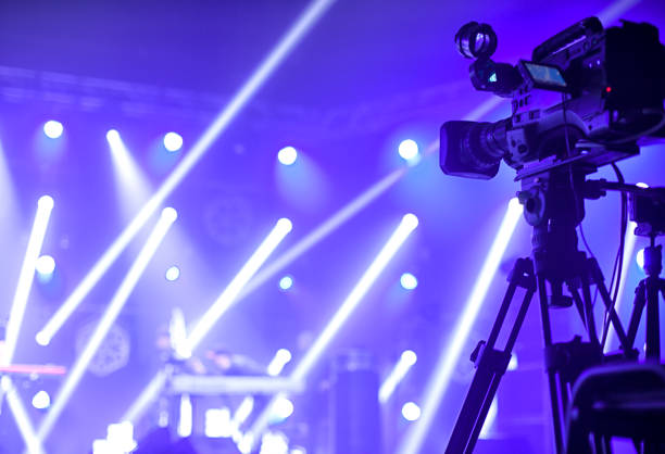 istock television camera. camera in a concert hall 1353822431