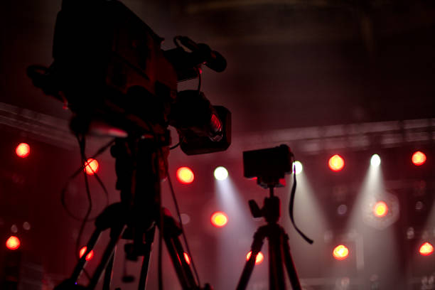 istock television camera. camera in a concert hall 1353822483