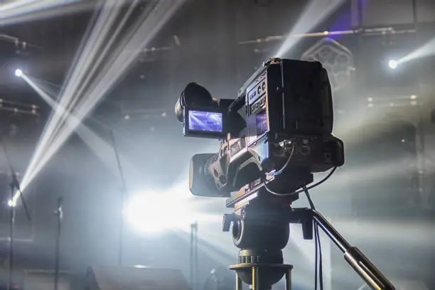 Photo of television camera. camera in a concert hall