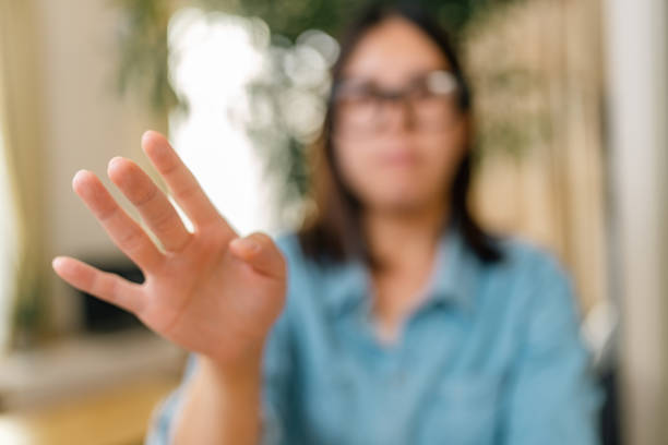 istock Young woman wearing smart glasses and working at augmented reality metaverse working space 1353822805