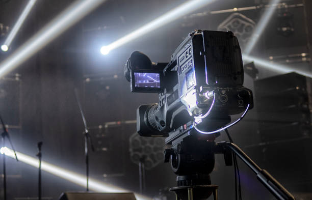 istock television camera. camera in a concert hall 1353822813