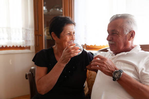 istock Senior Couple Drinking Water 1353822837