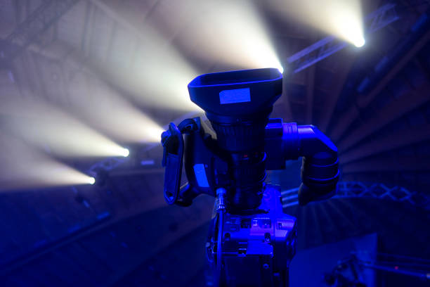istock television camera. camera in a concert hall 1353823017