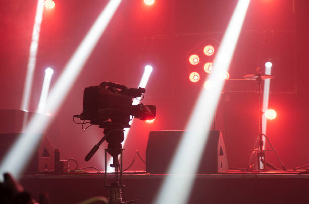 istock television camera. camera in a concert hall 1353823083