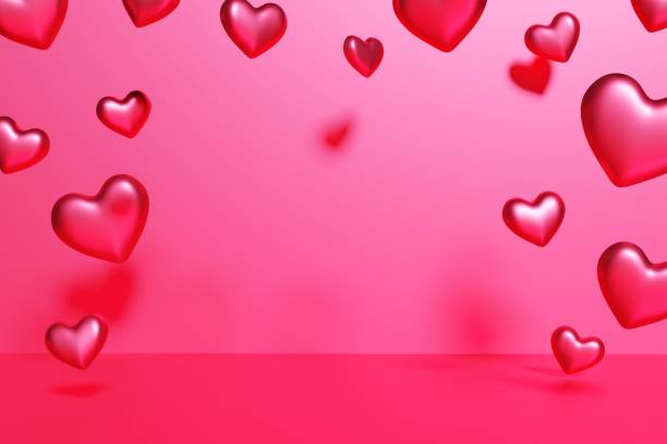 istock 3d render of red flying hearts frame on a pink background 1353823494