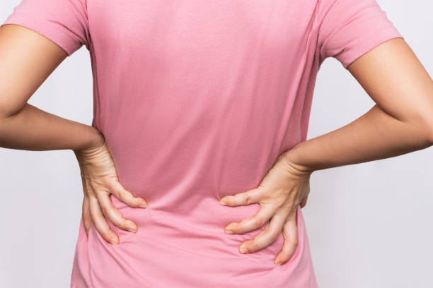 istock Back pain. Sciatica, osteochondrosis, gallstone disease, pancreatitis, kidney disease 1353825055