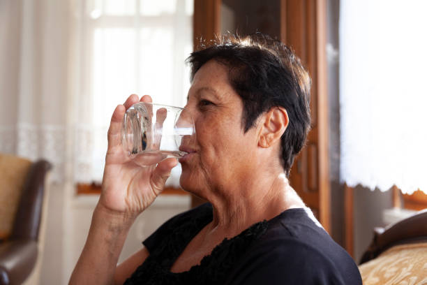 istock Senior Women  Drinking Water 1353825214