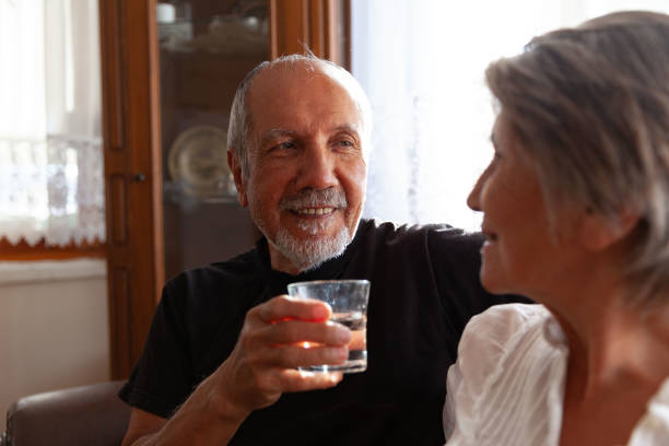istock Happy senior couple face to face 1353825216