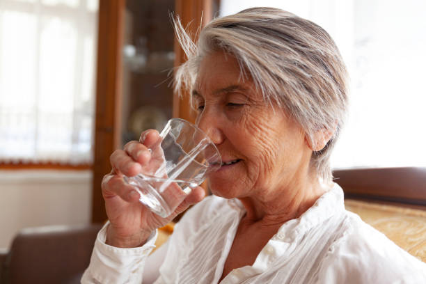 istock Senior Women  Drinking Water 1353826962