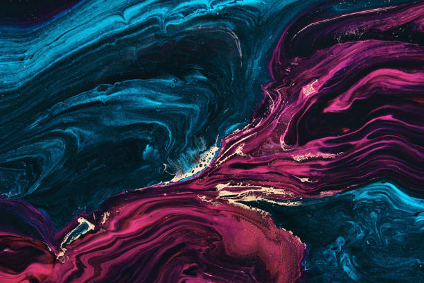 istock Fluid Art. Metallic Gold in abstract blue and purple wave. Marble effect background or texture 1353827534