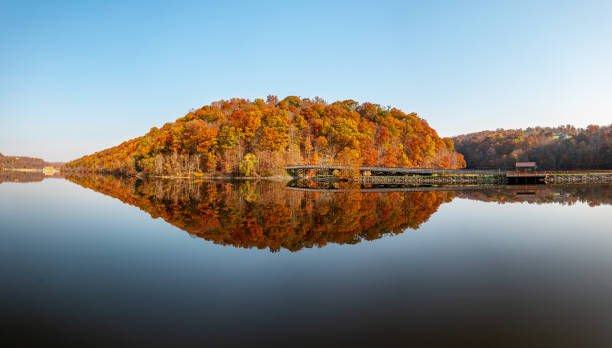 istock Perfect reflection of autumn leaves in Cheat Lake 1353829231