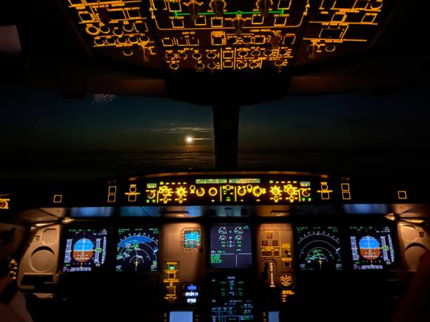 istock Night view of a cockpit wikte full moon 1353831196