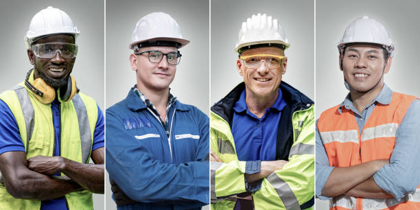 istock group workers men engineering standing with confident with blue working suite dress and helmet in front of blue background. Concept of smart industry worker operating. Diversity of people of industry. 1353834231