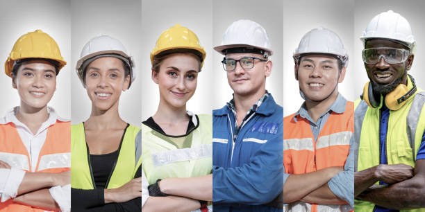 istock group of manual workers engineering standing with confident in front of white background. Concept of smart industry worker operating. Diversity of people of men and women of Asian, Caucasian, African. 1353834250