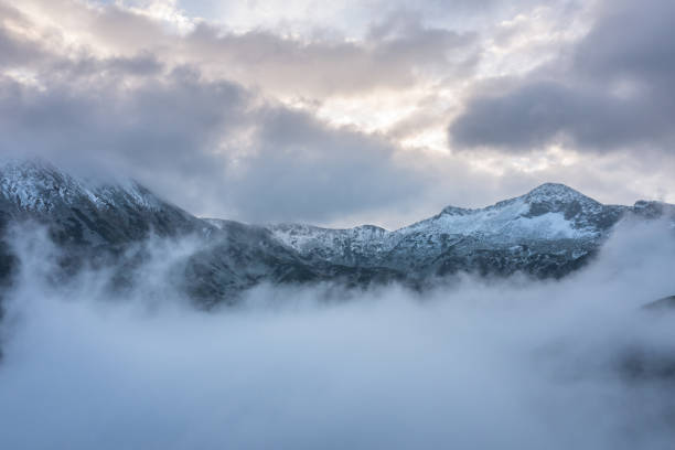istock Misty lake in the mountain 1353841321