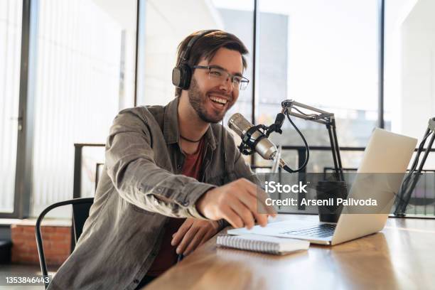 Laughing Man Host Streaming Podcast In Studio Stock Photo - Download Image Now - Podcasting, People, Blogging