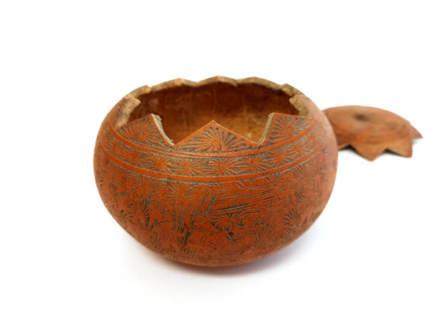 istock Front view pottery pot made of painted clay. Handmade ceramic kitchen utensil. Arabic spice rack, Earthenware crockery. Carved bronze bowl with lid isolated on white background. Oriental style. 1353847304