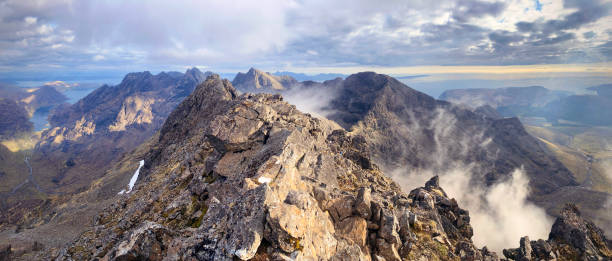 Cuillin ridge Clouds clearing on the Cuillin ridge - Isle of Skye, Scotland isle of skye stock pictures, royalty-free photos & images
