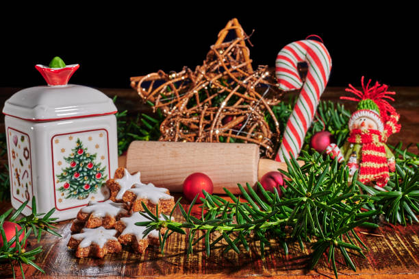 istock Cinnamon stars, a ceramic biscuit tin and other christmas decoration. 1353849053