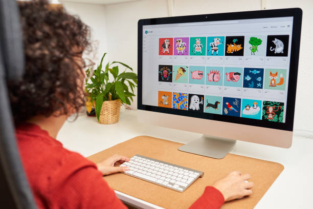istock Woman buying NFT online on her desktop computer 1353849381