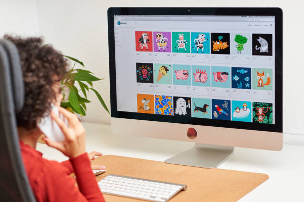istock Woman buying NFT online on her desktop computer 1353849439