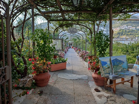 Ravello Campania, Italy - September 22, 2021: Paintings on display in the Garden of the Vittoria Restaurant