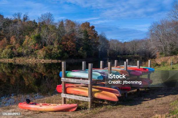 Colorful Canoes By A Lake Stock Photo - Download Image Now - Reston, Autumn, Beauty In Nature