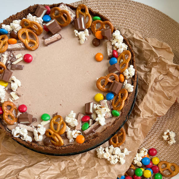 istock Chocolate cake decorated by colorful dragees 1353852244