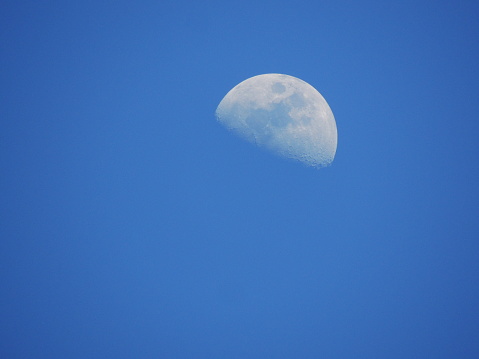 salvador, bahia, brazil - november 12, 2021: view of the moon in the sky in the city of Salvador.
